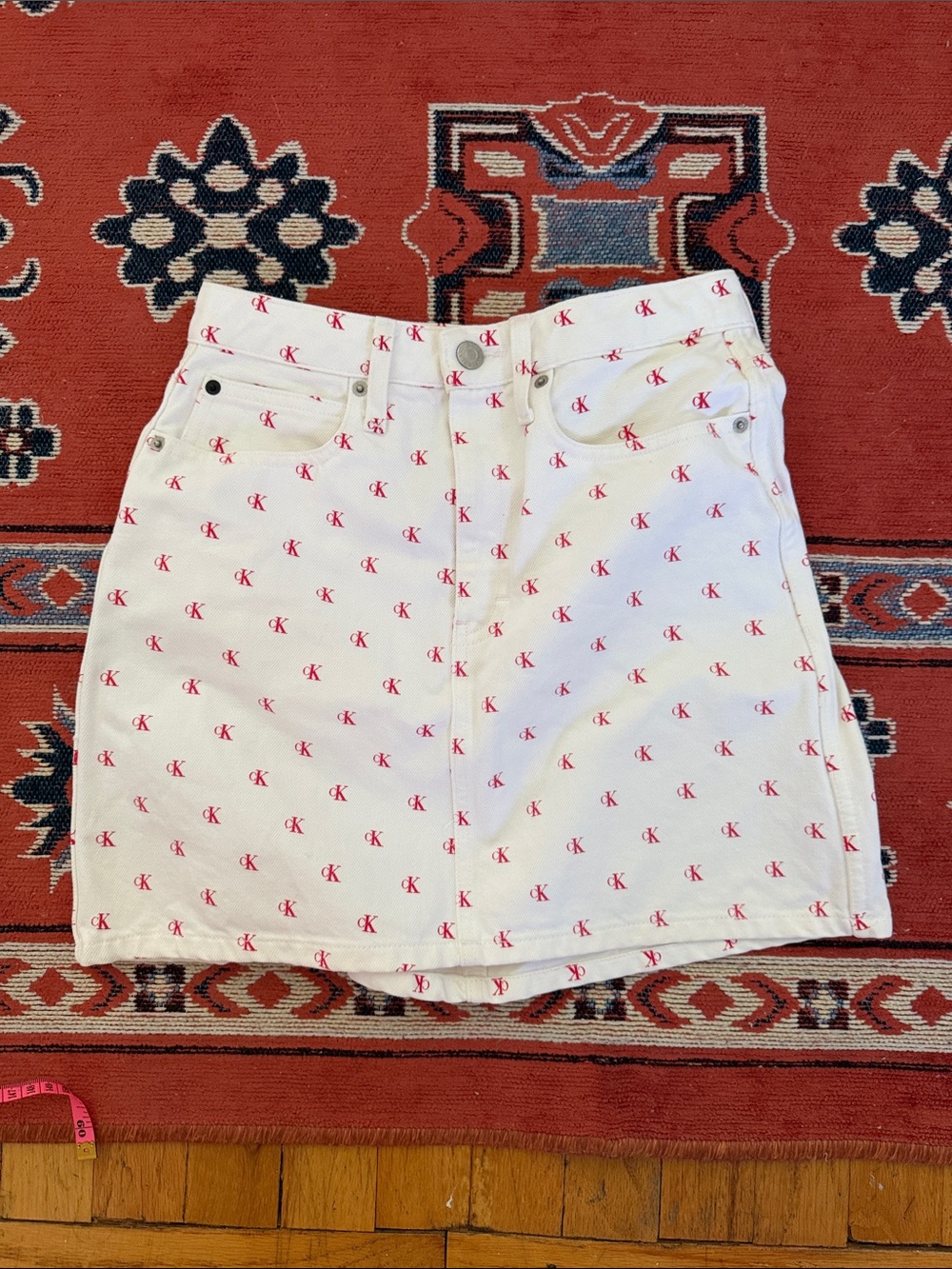 Calvin Klein White Denim Mini Skirt with Red CK Logo Pattern